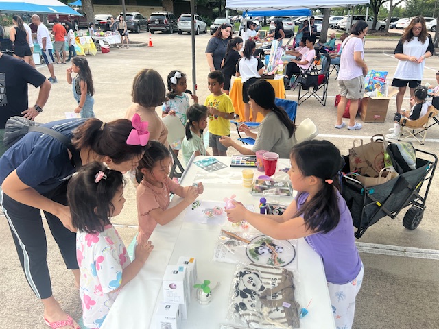 Students getting face painted at Back to School Bash event